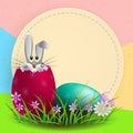Composition with a rabbit, a round frame, Easter eggs with grass and flowers, Royalty Free Stock Photo