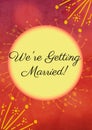 Composition of we\'re getting married in black text on yellow circle with yellow decoration on red