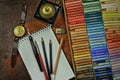 Pastels, pencils and notebook of the artist