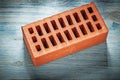 Composition of red bricks on wooden board construction concept Royalty Free Stock Photo