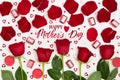 Composition of red roses, chocolates, sequins hearts, candles, inscription Happy Mother`s Day. Flat lay, top view, close up Royalty Free Stock Photo