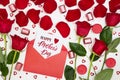 Composition of red roses, chocolates, sequins hearts, envelopes, candles, inscription Happy Mother\'s Day. Royalty Free Stock Photo