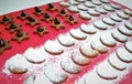 Homemade pepper ginger mini biscuits in various forms, with chocolate and icing sugar