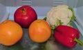 bright vegetables and fruits on foggy frosted glass