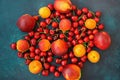 Composition Ripe Organic Summer Fruits Berries Sweet Cherries Nectarines Apricots Vibrant Colors on Dark Blue Background.
