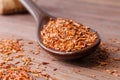 Composition of Rooibos tea is located on a ceramic spoon. Macro Royalty Free Stock Photo