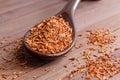 Composition of Rooibos tea is located on a ceramic spoon. Macro Royalty Free Stock Photo