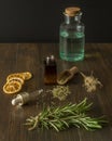 Composition of rosemary branches, chopped dried rosemary, dried orange slices and mint drink, as well as a herbal cosmetic
