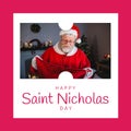 Composition of saint nicholas day text over santa claus holding red sack Royalty Free Stock Photo