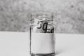 50 EURO in a glass jar with empty white label or note for your text. Concept of Royalty Free Stock Photo