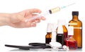 Composition set of medicine bottles stethoscope syringe in hand Royalty Free Stock Photo