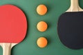 Composition with set of ping pong paddles and orange balls Royalty Free Stock Photo