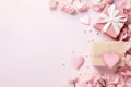 Composition soft pink for Valentine\'s Day, tied with ribbon gift box surrounded by blooming flowers, small hearts Royalty Free Stock Photo