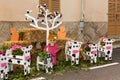 Composition of a shepherd and his cows, decorated with flowers and hays, on \