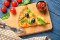 Composition with slice of tasty pizza on wooden table Royalty Free Stock Photo