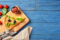 Composition with slice of tasty pizza on wooden table Royalty Free Stock Photo