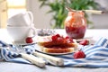 Composition with slices of bread and delicious strawberry jam on light table Royalty Free Stock Photo