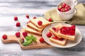 Composition with slices of bread and delicious strawberry jam on wooden table Royalty Free Stock Photo