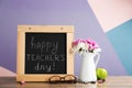 Composition with small chalkboard for Teacher`s day