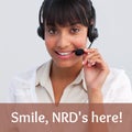 Composition of smile nrd is here text over asian businesswoman using phone headset