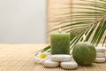 Composition with spa stones and candles on bamboo mat. Space Royalty Free Stock Photo