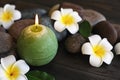 Composition with spa stones, flowers and candle Royalty Free Stock Photo