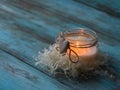 Composition of spa treatment candle on wooden background. Copy space Royalty Free Stock Photo