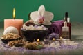 Composition of spa treatment on the light wooden table and green Royalty Free Stock Photo