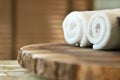 Composition with spa treatment, towels on wooden tray background