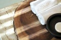 Composition with spa treatment, towels on wooden tray background