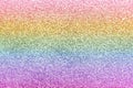 Composition of sparkling rainbow glitter as background Royalty Free Stock Photo
