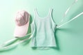 Composition with sportswear on pastel background. Trendy colorful sportswear with copy space for text. Fitness, sports concept.