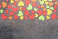 Colorful hearts from paper stacked on a dark background. Royalty Free Stock Photo