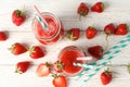 Composition strawberry cocktails on white wooden table. Summer berry Royalty Free Stock Photo