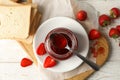 Composition with strawberry jam on wooden background, top view Royalty Free Stock Photo