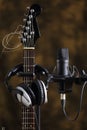 Microphone, earphones and electric guitar Royalty Free Stock Photo