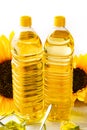 Composition with sunflower oil on white wooden table on white background Royalty Free Stock Photo