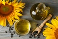 Composition with sunflower, seeds and oil on gray background Royalty Free Stock Photo