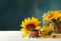 Composition with sunflower, seeds and oil on white wooden Royalty Free Stock Photo