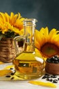 Composition with sunflower, seeds and oil on wooden background Royalty Free Stock Photo