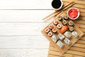 Composition with sushi rolls on background, top view. Japanese food