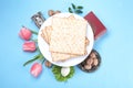 Composition with symbolic Passover Pesach items on color background