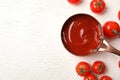 Composition with tasty homemade tomato sauce and space for text on white wooden background Royalty Free Stock Photo