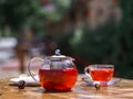 A summer fruit tea with fresh strawberries and natural currant on a natural background. Healthful and organic breakfast. Royalty Free Stock Photo