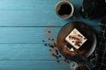 Composition tiramisu and coffee on wooden background. Tasty dessert
