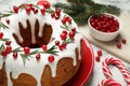 Composition with traditional homemade Christmas cake on white marble table Royalty Free Stock Photo
