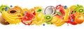 Composition of tropical fruits splashing in flowing juice, watermelon, orange, coconut, kiwi, mango, banana, blueberries