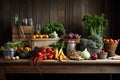 Composition with variety of raw organic vegetables on wooden table in kitchen, Fruits and vegetables on a wooden table in a rustic