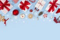 Composition of various Christmas decoration objects on blue frosty background