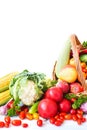 Composition with vegetables and fruits in wicker basket isolated on white. Royalty Free Stock Photo